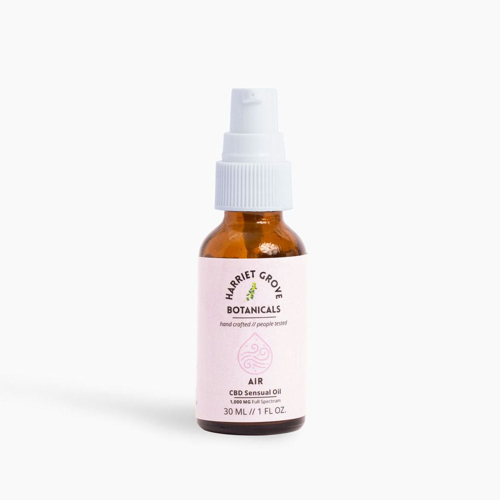 1 oz bottle of AIR Sensual Oil with a white cap